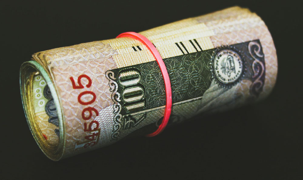 How much money do the Olympics make, and what is its source?
